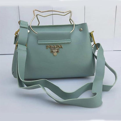 Cat handle cross body bag